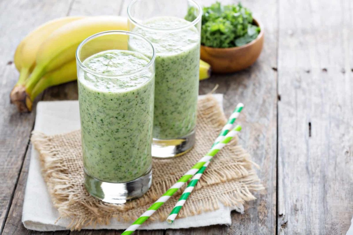 green smoothie with banana and fresh kale